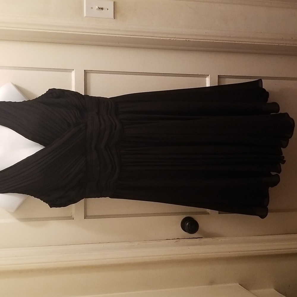 Black A line dress with v neck and full swing skirt